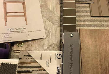 Color and material samples across a desk